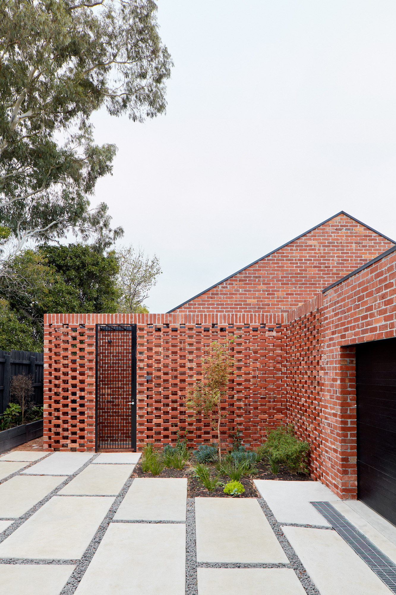 Bardolph Gardens residences with perforated brick wall facade
