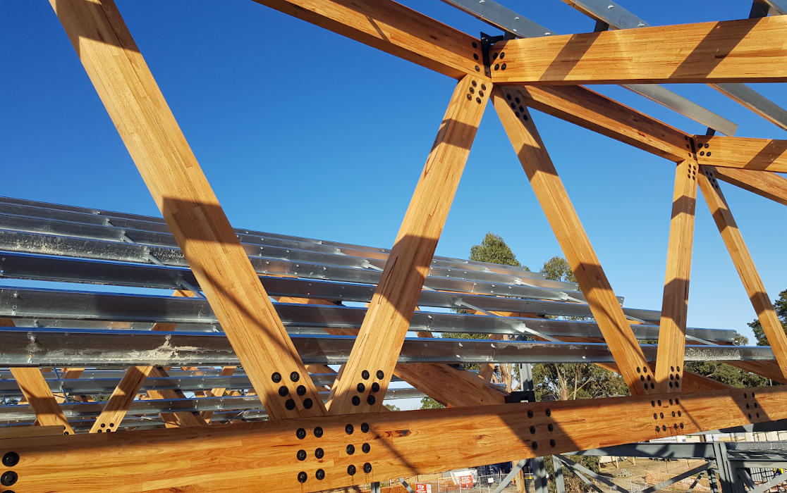 Glulam beams forming sawtooth roof during construction