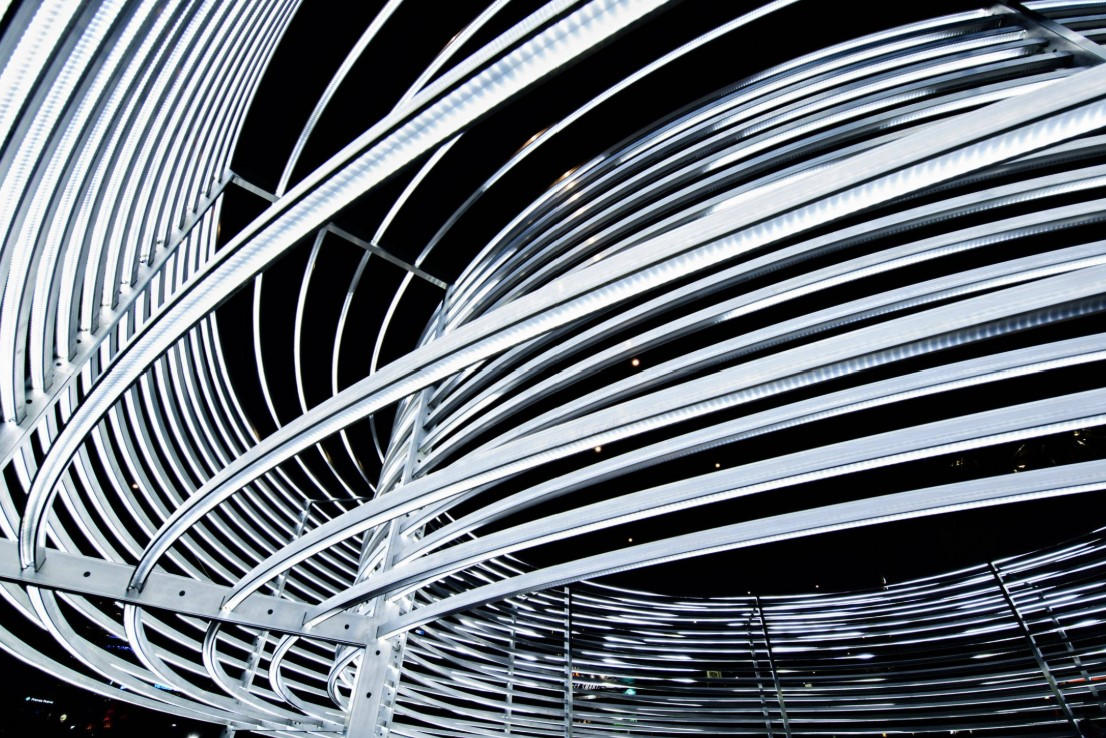 Close up of Asif Khan's Radiant Lines, curved shapes of illuminated aluminium, art installation engineered by Vistek